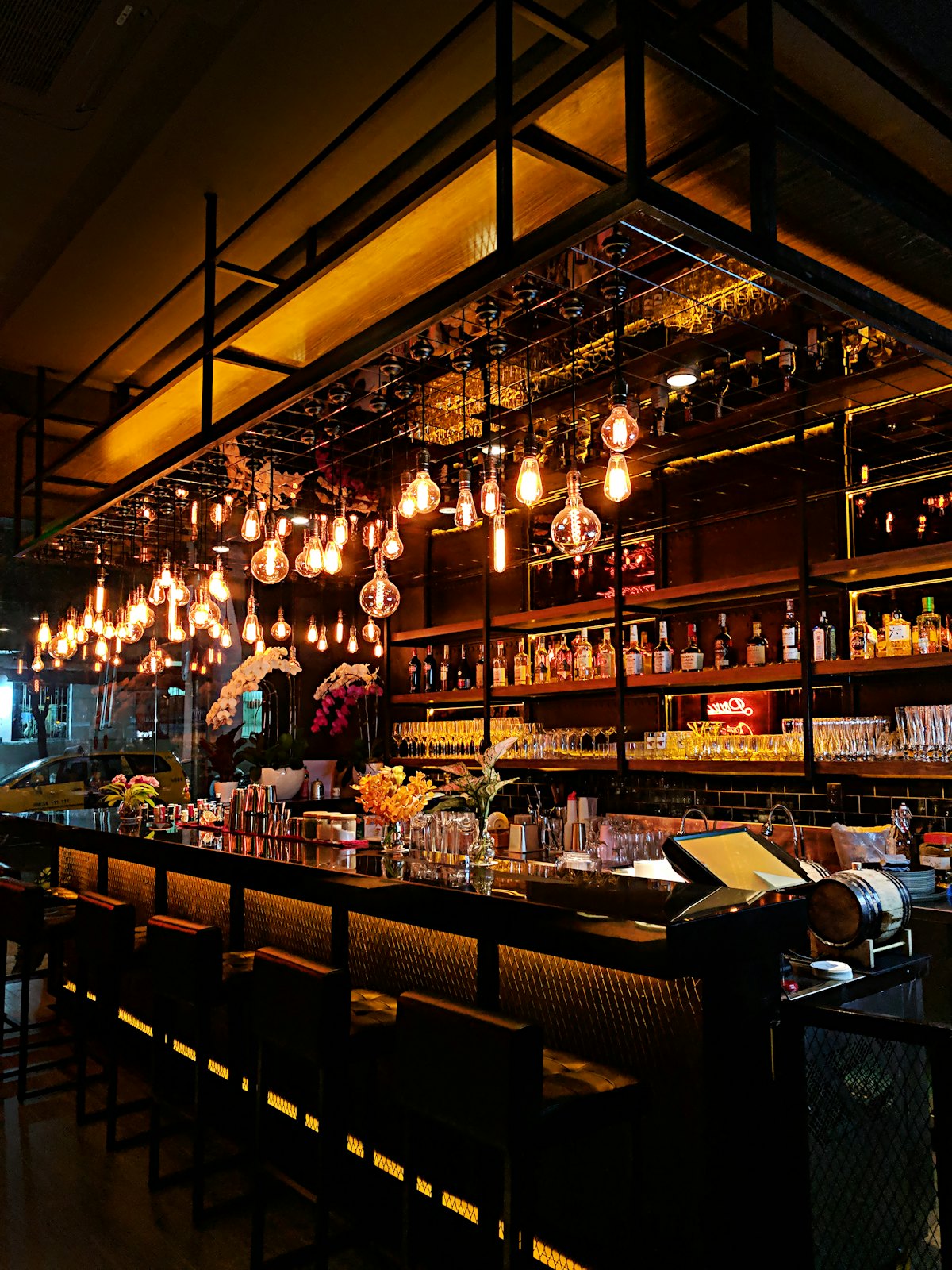 A warm, softly lit social venue ready for the night